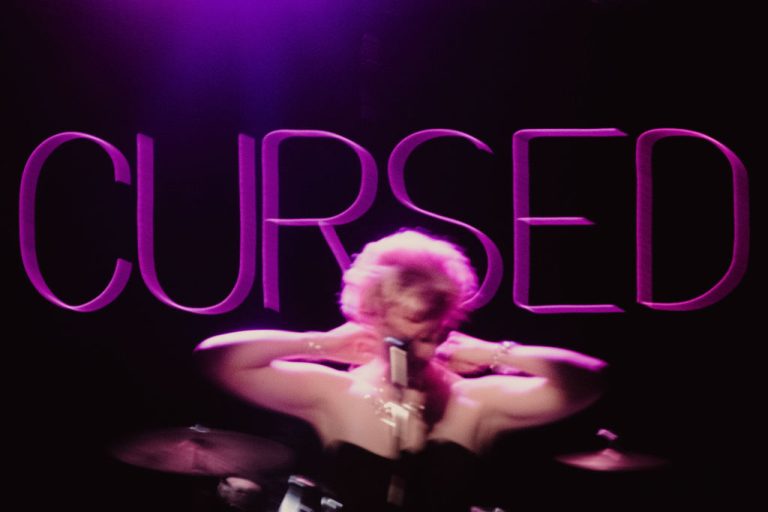 Cursed — neon sign and vintage microphone, HERE Arts Center, New York 2024