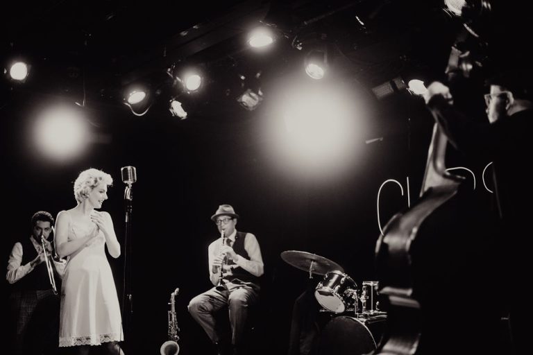 Cursed - the band across the stage with Marilyn at the microphone. HERE Arts Center, New York 2024. Photo: David Goddard